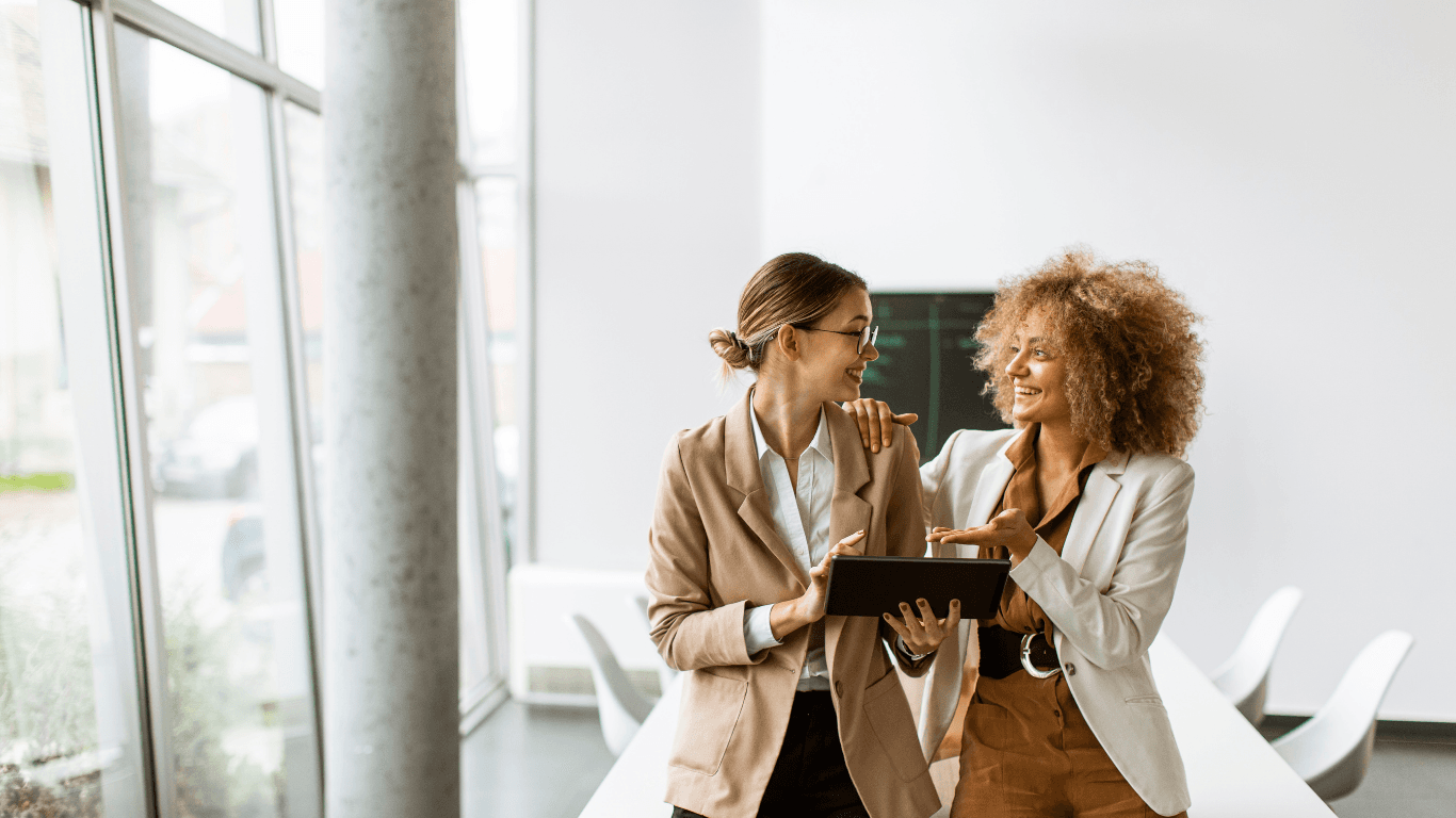 Two professional women in conversation